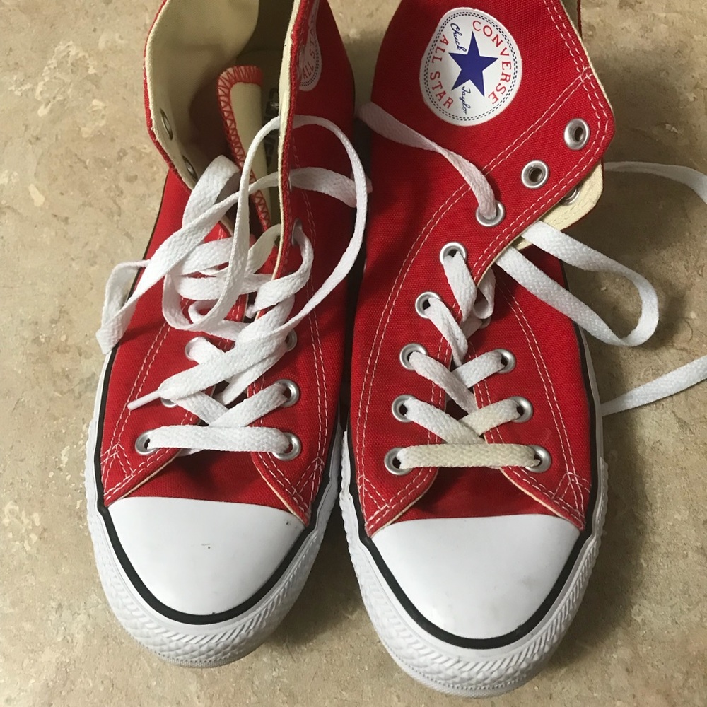 Red high top Converse Chuck Taylors